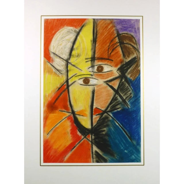 Vibrant French cubist face oil pastel painting in bold colors of yellow, orange and blues, circa 1960. Original artwork on...