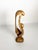 Elegant French wooden sculpture depicting a stylized mother and child, carved in an expressive modernist manner. The...