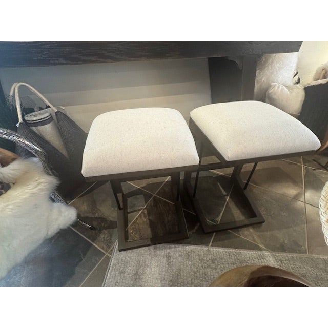 Attributed to Four hands Finn Stools. Set of 2. A stunner from every angle, this architecturally inspired bar stool...