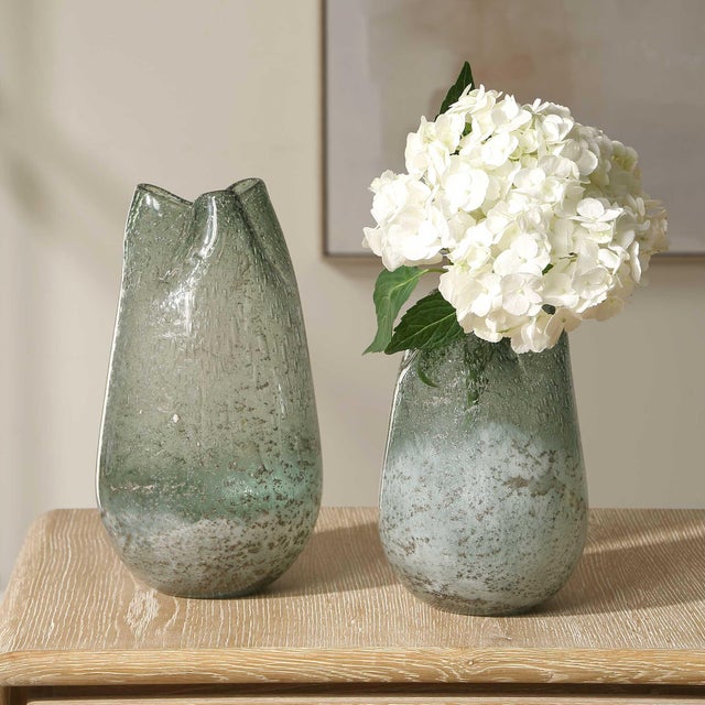 This Striking Pair Of Glass Vases Feature An Elegant Silhouette With An Artfully Crinkled Rim. The Seeded Glass Has A...