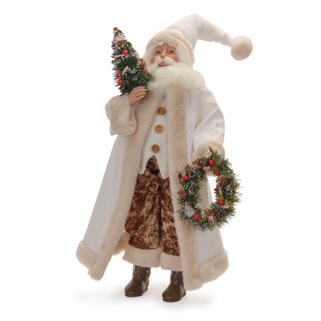 Celebrate the magic of the holiday season with this charming Beige Santa with Wreath and Tree figurine. Standing 21.5...