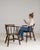 A pair of spindle-back armchairs whose dark wood, turned legs gives it real character at first glance. Dating to 1880s and...