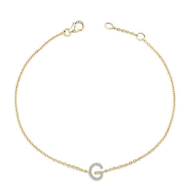 Immerse yourself in the understated elegance of this 10K yellow gold bracelet, for an enrapturing shimmer that captures...
