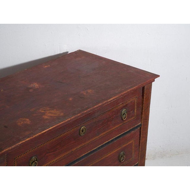Central european biedermeier chest of drawers in pinewood, with four graduated drawers, originally from central europe and...