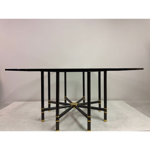 This elegant octagonal dining table, by Karl Springer, exemplifies the designer’s refined balance of geometry, luxury...
