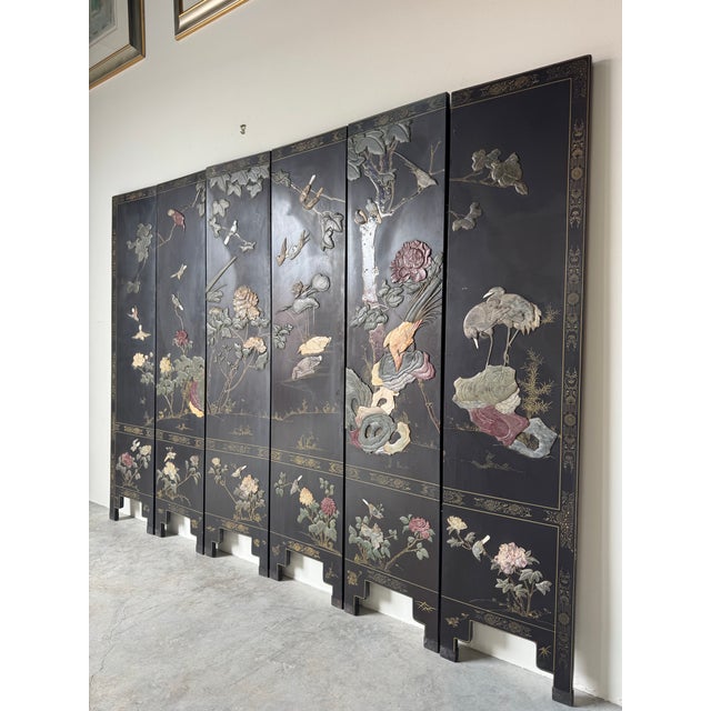 Impressive vintage Asian six-panel folding screen featuring finely hand-carved soapstone reliefs depicting birds, blooming...