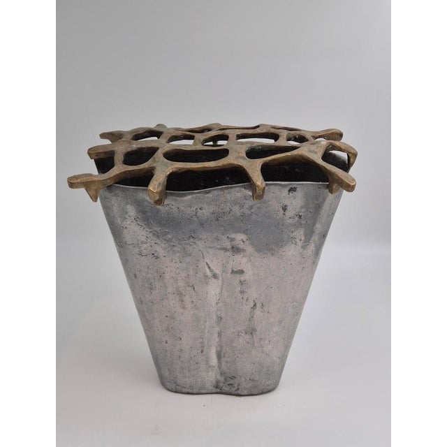 A large urn / vase in brass and aluminium, with monogram DM. Designed by David Marshall, Post-modern. Beautiful decorative...