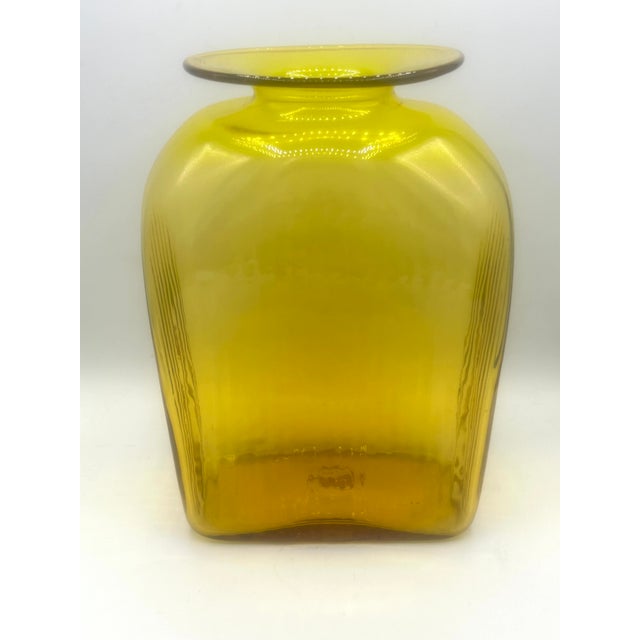 Vintage Blenko model 6420 vase designed by Joel Philip Myers in 1964. Handblown in Blenko’s vibrant Jonquil yellow glass,...