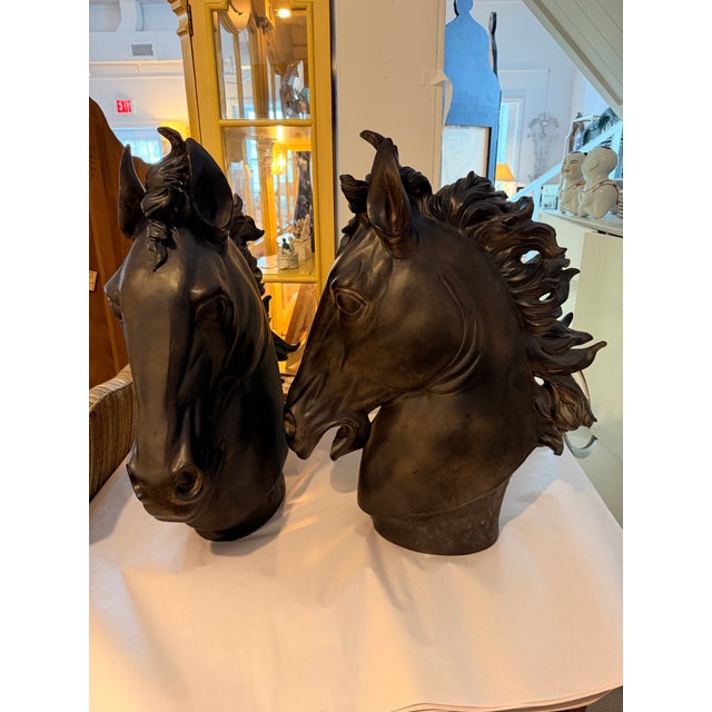 A fabulous pair of black horse heads. These are so decorative! They are very detailed and have movement to their look....