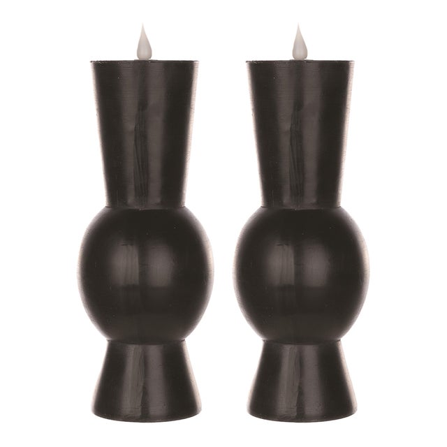 Add a touch of sophistication and ambiance to your space with the Simplux Designer LED Candle Set. Featuring a sleek black...