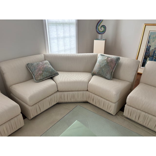 Fabulous 3 piece postmodern fully upholstered sectional sofa with various set up options. It can be assembled as a along...