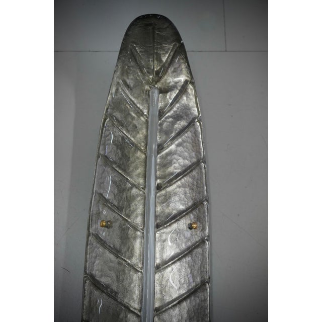 Beautiful design for this leaf-shaped applique, all silver with a vertical white rib. Refinement and class as in the...