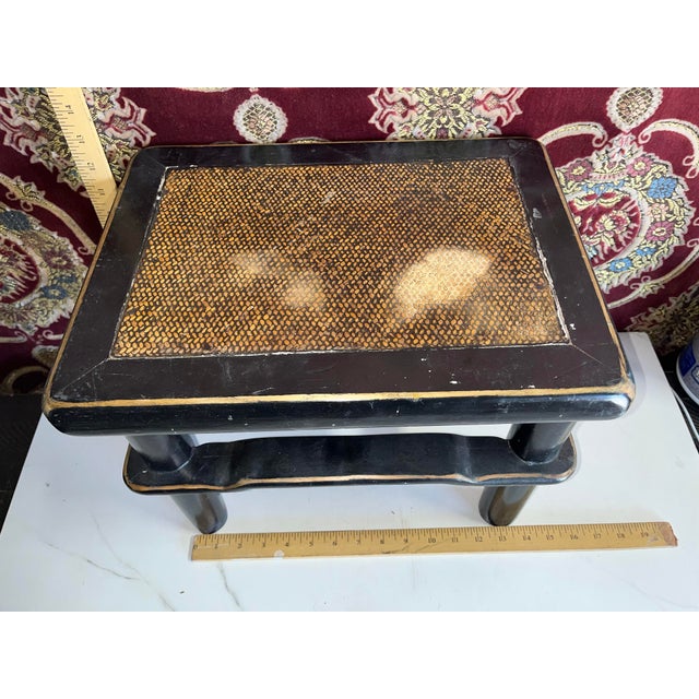 Well aged antique wood stool with cane top. Shows signs of wear to cane and paint but overall very solid and sturdy...