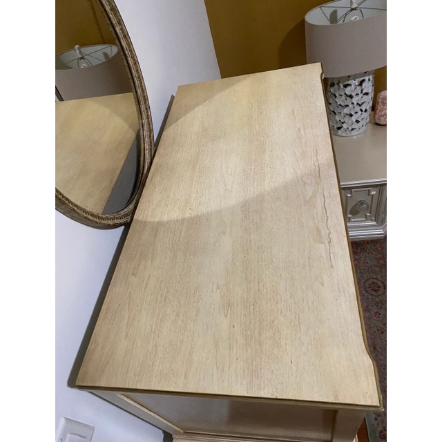 Mirror not included. An Italian style Hollywood Regency Dresser/Chest of Drawers. Ornate detailing prevails throughout;...