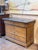 A distinguished antique French Louis Philippe commode showcasing exceptional burl walnut figuring and the restrained...