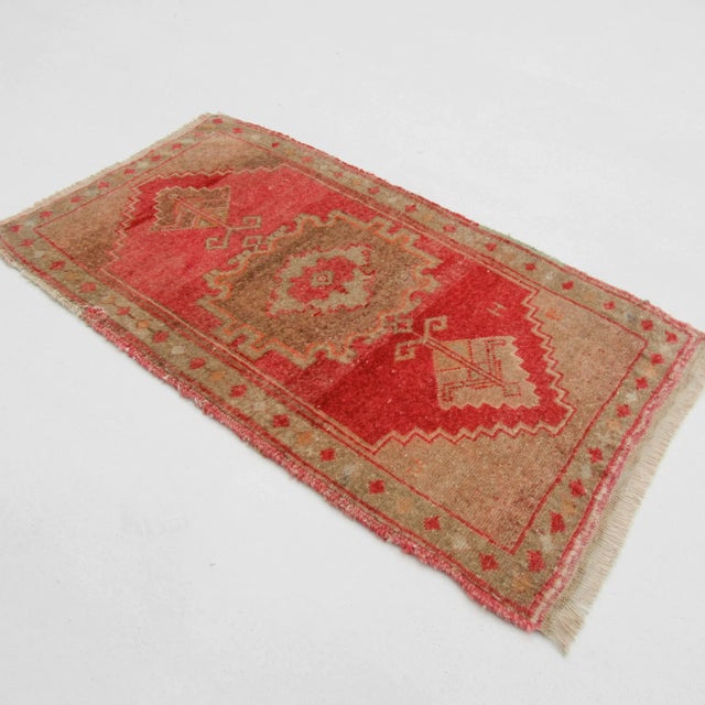 Vintage handknotted decorative mini rug from Konya region of Turkey. Approximately 50-60 years old. In very good condition.
