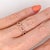 This beautiful band features 60 natural earth mined diamonds set in solid 14K Rose gold. This diamond band makes a lovely...