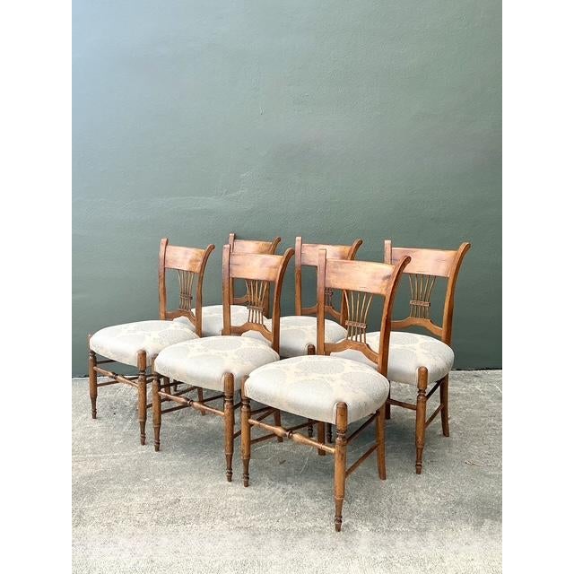 This exceptional set of six dining chairs from the renowned Baker Furniture "Harvest" collection represents the pinnacle...