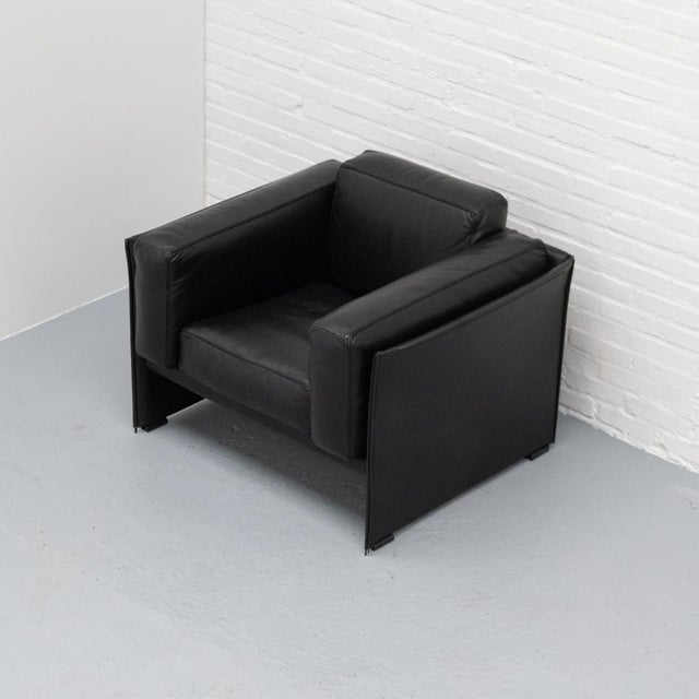 The 405 Duc armchair was designed in 1976 by Mario Bellini for Cassina and is a distinctive example of Italian 1970s...