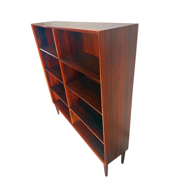 Overview A handsome example of Danish mid-century cabinetmaking, this open two-bay bookcase dates to circa 1960–1970....