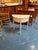 The Swedish Gustavian Painted Demi-Lune Side Table is an elegant and functional piece of furniture for any home. The...