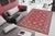 Enhance your home with this exquisite hand-knotted Super Kazak rug, crafted from fine hand-spun wool and dyed with all-...