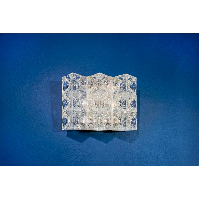 Murano glass wall lamp on chromed metal support. Designer Albano Poli Manufacturer Poliarte 1970s I have official proof of...