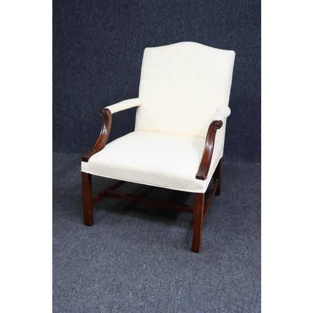 Chippendale Style Upholstered Lolling Chair, decorative upholstery, mahogany stretcher base and arms.
