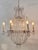 A genuine early 19th century French candle chandelier now converted to electric. Crystal and cut glass. Measurement of...
