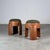 Conceived as a harmonious pair, these handcrafted stools celebrate the dialogue between material depth and sculptural...