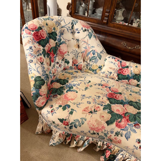 Bring classic elegance and a touch of romance to your space with this vintage French Provincial style conversation sofa....