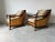A stunning set of three Modern Mandalay lounge pieces featuring two deep, sculptural rattan armchairs and a matching...