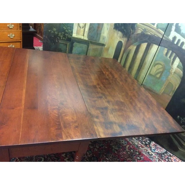 Item: Vintage Cherry Drop Leaf Table. Age & Condition: Circa 1950s. Good, refinished condition. Dimensions: 21″ wide x 46″...