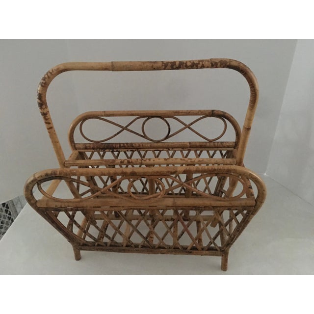 Vintage rattan magazine stand for your Mid Century or Retro decor ! Perfect condition , measuring 17”x 10” x 17.5”. Circa...
