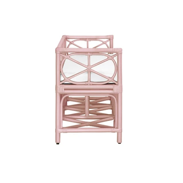 Brand new special order item. Not vintage. Elegant decorative bench featuring a painted pink rattan frame that brings...
