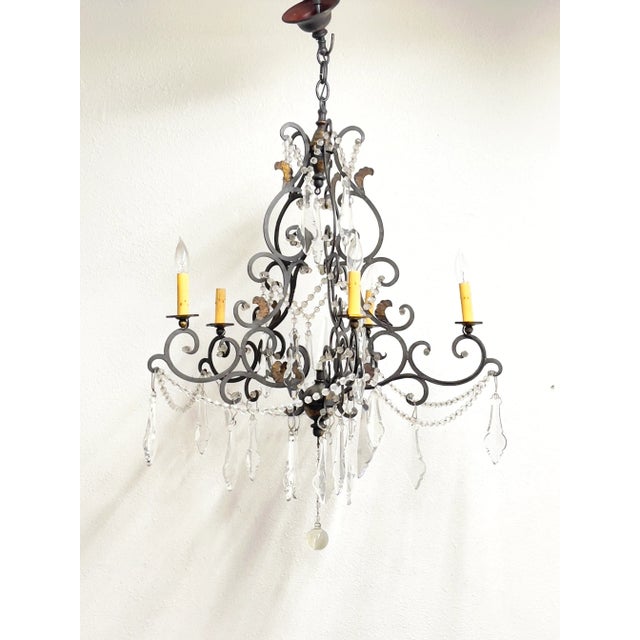 Beautiful vintage iron & glass chandelier in excellent vintage condition.