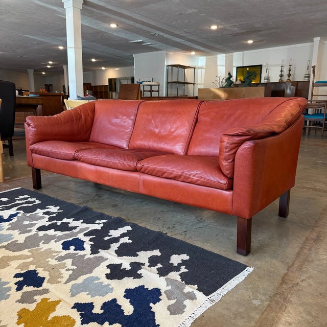 Vintage mid-century Danish modern leather 3-seater sofa manufactured by HJ Møbelfabrik/Stouby, Denmark. Features supple...