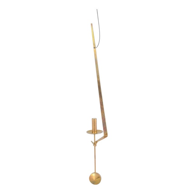 Wall Candleholder in Brass with Pendulum Suspension by Pierre Forsell for Skultuna, 1960s For Sale