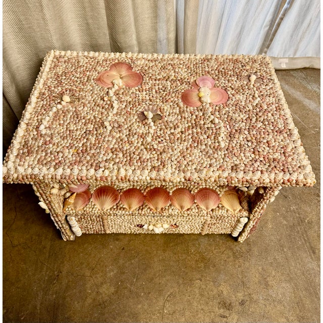 Gorgeous vintage hand made solid wood covered with seashells side table with drawer.