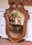 Crafted in England circa 1870, this elegant antique Rococo Revival wall mirror is carved from richly toned walnut and...