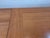 A 36 inch square draw leaf table made in Denmark. Opens too 65inches.