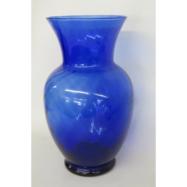 This beautiful Large Vase is made out of colored glass. This lovely Vase features a gorgeous cobalt blue color gradient...