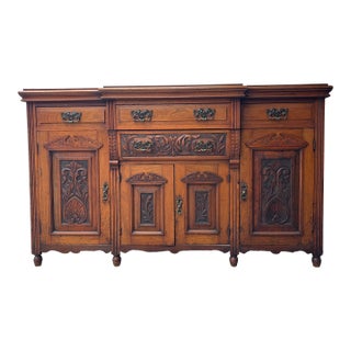 Antique Victorian Walnut Sideboard Featuring Intricate Hand Carvings and Original Ornate Brass Hardware For Sale