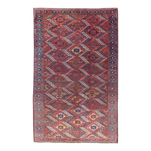 Antique Turkestan Beshir Rug With Deep Red Field and Repeating Diamond Motifs For Sale