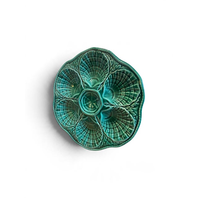 vibrant vintage French majolica oyster plate by Faïenceries de Sarreguemines featuring six molded scallop-shell wells and...