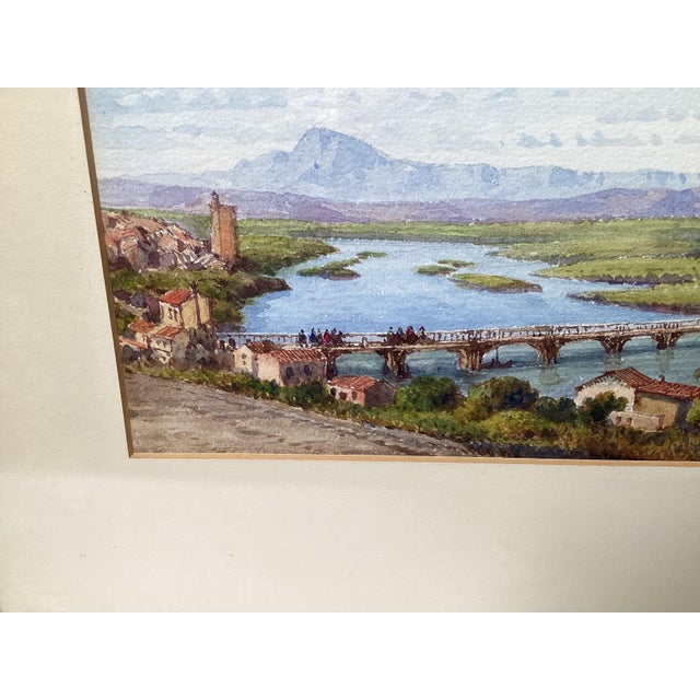 Early 20th century pair of original watercolors of Italy. Signed by the artist and nicely matted with a silver gilt frame.