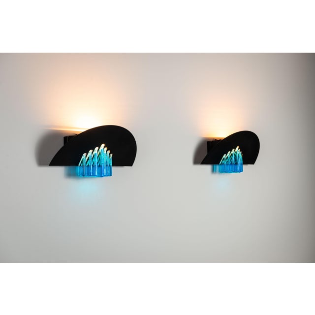 This vintage pair of wall lamps by AV Mazzega exemplifies the brand’s mastery in Murano glass and mid-century Italian...