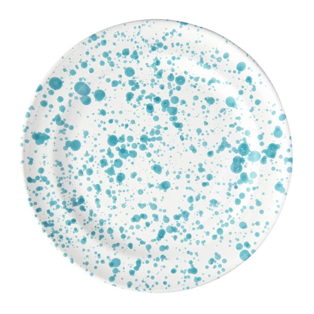 This hand-painted ceramic dinner plate is great for serving your favorite dishes or looks great as decor. Hues of...