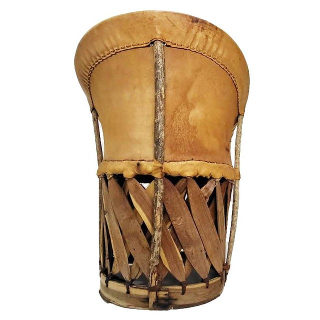 Bring an organic, sculptural presence into your home with this exceptional pair of vintage Mexican Equipal bar stools....
