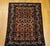 "This antique Persian Malayer rug from the early 1900s is a rare and delightful piece — an elegant allover design set in a...